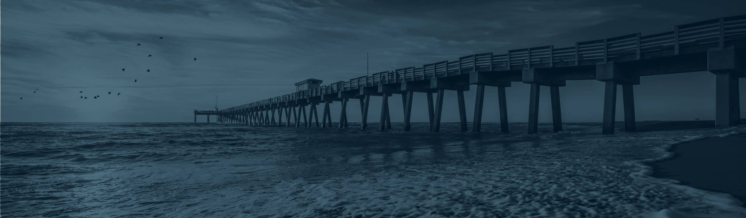 Picture of beach and boardwalk at sunset