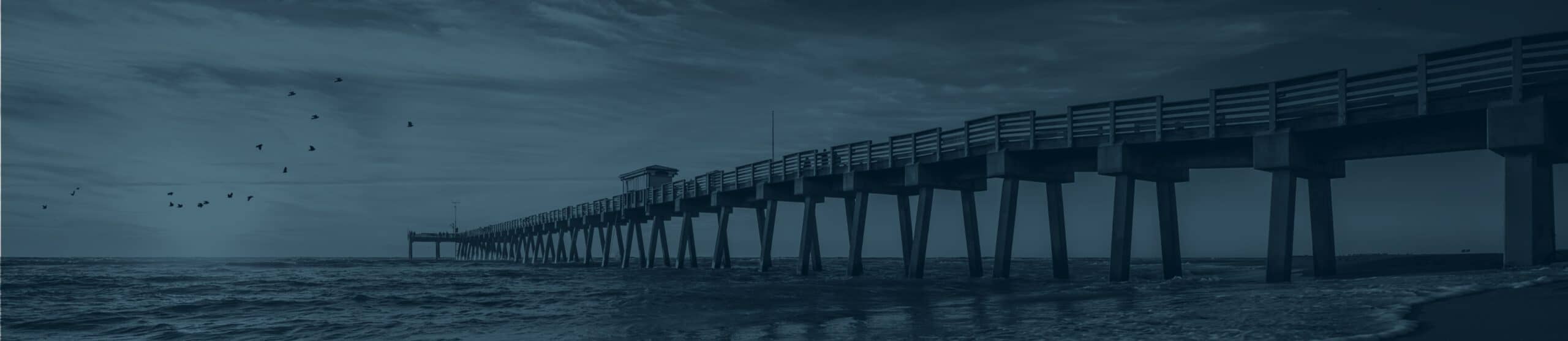 Picture of beach and boardwalk at sunset